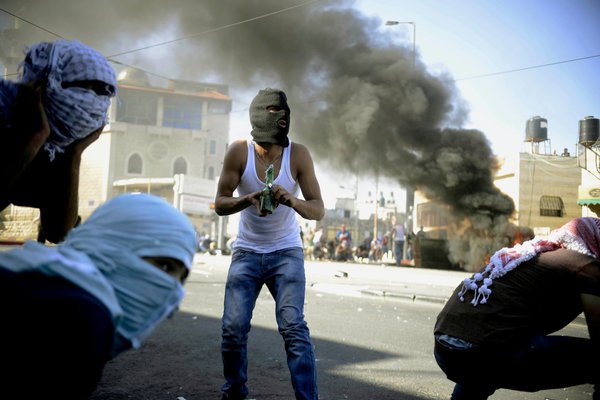 Clashes in East Jerusalem, sparked by the revenge killing of a Palestinian teenager.  